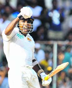 Sri Lankan cricket captain Mahela Jayawardene celebrates victory at the conclusion of the fourth day of the third and final Test match between India and Sri Lanka at The P. Saravanamuttu Stadium in Colombo