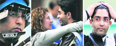 (L to R): Abhinav Bindra of India reacts during the men's 10m air rifle final of the shooting competition at Beijing. Bindra is hugged by his coach Gabriele Buhlmann after the men's 10m air rifle final. Bindra celebrates after winning the Men's 10m Air Rifle shooting title
