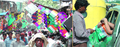 Kites on sale at Lal Kuan, Chandni Chowk in New Delhi (Left). The Kite Festival will be celebrated on the Independence Day. A vendor sells national flags in New Delhi on Tuesday.