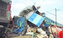 Rescue work at the site where two trains collided near Sahibabad railway station in Ghaziabad district. Padmawat Express hit Kanpur-Bhiwani Kalindi Express from behind