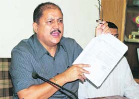 Former minister Ram Lal Thakur addresses a press conference in Shimla