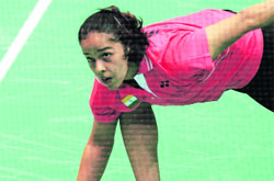 Saina Nehwal in action against Indonesia's Maria Kristina Yulianti during their women's singles quarterfinal match at the Beijing University of Technology Gymnasium on Wednesday.