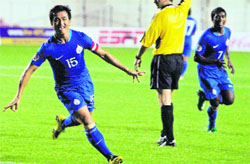 Indian captain Bhaichung Bhutia (L) celebrates after scoring a goal against Tajikistan during the final of the AFC Challenge Cup in New Delhi on Wednesday. India won 4-1.