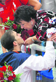Deborah Phelps kisses her son Michael Phelps after the men's 4x200m freestyle relay swimming final at the National Aquatics Centre during the 2008 Beijing Olympics  on Wednesday.
