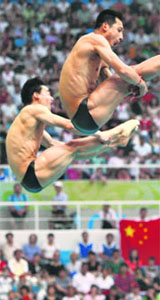 Wang Feng and Qin Kai of China compete in the men's synchronised 3m springboard diving final at the National Aquatics Centre during the 2008 Beijing Olympics on Wednesday.