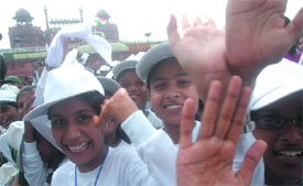 Schoolchildren enjoy the day at the Red Fort in New Delhi on Friday.