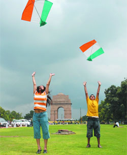 Children fly kites on the 61st Independence Day at the India Gate in New Delhi.