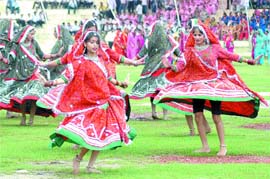 Girls perform during Independence Day celebrations at Guru Gobind Singh in Jalandhar on Friday.