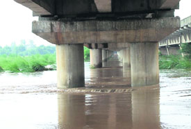 Water has started to recede as is evident from this picture taken under a bridge on the Sutlej in Ludhiana on Friday.