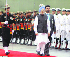 Prime Minister Manmohan Singh inspects the guard of honour during Independence Day celebrations at the Red Fort in New Delhi on Friday.