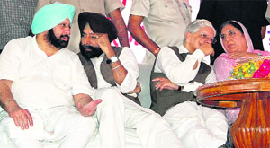 Capt Amarinder Singh, chairman, Campaign Committee, discuses a point with J.S. Brar at Baba Bakala near Amritsar on Saturday. Ashwani Kumar and Rajinder Kaur Bhattal are also seen in the picture.