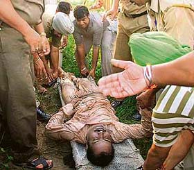 A victim, Sushil Kumar, after being pulled out from the nullah. Later in the evening, he died in hospital