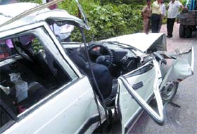 A badly smashed Maruti 800 car which hit a parked truck at Ridge Road in New Delhi