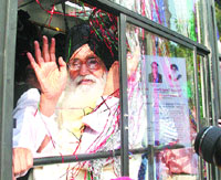 Punjab CM Parkash Singh Badal takes a bus ride during the launch of city bus service in Jalandhar on Sunday.