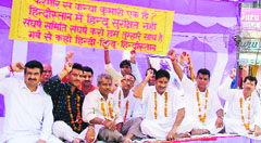 Activists of the Shri Govind Sewa Society resort to a hunger strike to support restoration of the land to the Shri Amarnath Shrine Board in Ludhiana on Sunday.