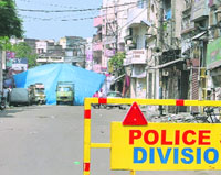 The road from Kailash Cinema Chowk to Domoria bridge remains blocked in Ludhiana on Sunday.
