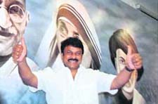 FIRST DAY FIRST SHOW: Telugu superstar Chiranjeevi arrives to address a media conference at his newly opened party office at Jubilee Hills in Hyderabad on Sunday. 