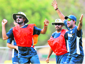 Harbhajan Singh (L), Virender Sehwag (C) and Yuvraj Singh take part in a warm up game during a practice session at the Rangiri Dambulla International Cricket stadium in Dambulla on Sunday.
