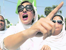 Supporters of Pakistan Muslim League take part in a protest against President Pervez Musharraf in Peshawar on Sunday.
