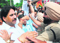 Activists of Shri Brahmin Sabha protest against publication of an article in a local vernacular daily in Mohali on Monday. 