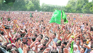 People throng the rally organised by the Hurriyat Conference in Srinagar on Monday.