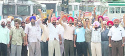 Roadways employees took out a protest rally in Ludhiana