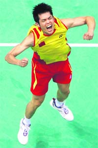 Lin Dan of China reacts after winning the gold medal for the mens badminton singles final match