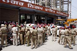 Cops were deployed in large numbers for the demolition.