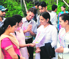 Candidates and members of different parties try to convince students for council elections in Himachal Pradesh University at Shimla on Tuesday.