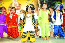 School students present a cultural programme during an I-Day function in Jalandhar.