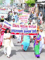 Members of the Sirsa District Mahila Congress hold a silent march on the occasion of the birth anniversary of former Prime Minister Rajiv Gandhi on Wednesday.
