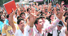 College students take out march in Srinagar in protest against the killing of their classmates in police firing recently