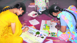 Young girls take part in a painting contest at Arya Girls College in Ambala Cantt
