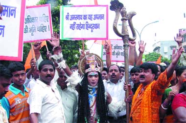 Bharatiya Janata Party workers and those from other Hindu bodies court arrest at Ashok Vihar police station in New Delhi on Thursday