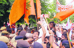 BJP and VHP workers hold a protest over the Amarnath land row, in Gurgaon