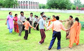HELPING HANDS: Children play on the premises of Paryas, a school for special kids, in Sirsa