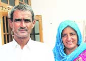 Mahipal and Krishna Devi, parents of Vijender Kumar.