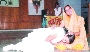 Students of the Khalsa College for Women enact a play during a talent hunt show in Amritsar on Friday.