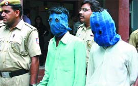 The South Delhi police arrested three persons (one not seen) in the Qutub Minar murder case in New Delhi on Friday. Tribune photo