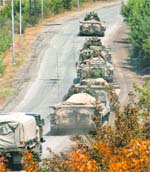 A Russian military column leaves the Georgian town of Gori on Friday.
