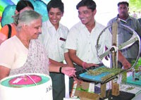 Chief Minister Sheila Dikshit interacts with schoolchildren after inaugurating Rajiv Gandhi Akshay Urja Divas 2008, organised by TERI at National Bal Bhawan in New Delhi on Saturday.