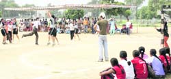 A handball match in progress during the Ludhiana Inter-Zonal Tournament at Punjab Agricultural University in Ludhiana