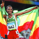 Ethiopian Kenenisa Bekele sprinted to victory in the 5,000 metres to become the first man to complete the Olympic long-distance double since 1980. He retained his 10,000 title last Sunday.