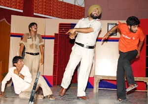 A scene from the play "Main Hoon Don" staged by the Sparsh Theatre Society in Abohar. 