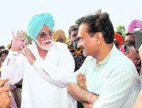 Irrigation minister Janmeja Singh Sekhon apprises Prabhanshu Kamal, joint secretary, Centre, of the extent of flood damage in Ferozepur on Sunday.