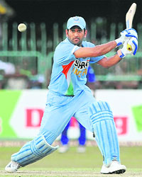 Mahendra Singh Dhoni plays a shot during the third ODI between Sri Lanka and India at the R. Premadasa Stadium in Colombo on Sunday. Dhoni elected to bat after winning the toss. 