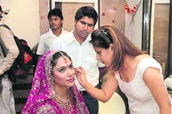 Chandigarh-based model Chandni undergoes bridal make-up at Asmis Creative Strokes Make-up Studio, which opened in Chandigarh recently