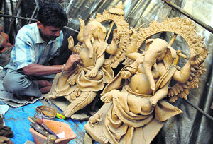 An artist prepares idols of Lord Ganesha at a workshop in Shimla. The idols are being prepared for Ganesh Festival which starts on September 3. 