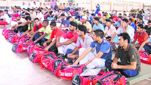 Trainees of the Sports Authority of India at a function organised to hand over sports kits in Ludhiana on Monday.