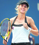 Elena Dementieva of Russia pumps her fist after beating Akgul Amanmuradova of Uzbekistan in their match at the U.S. Open tennis tournament in Flushing Meadows, New York, on Monday. 